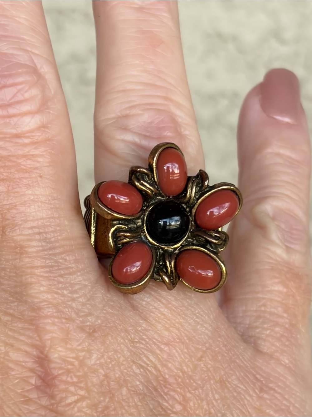 Vintage-Inspired Flower Ring with Coral Petals and Black Center